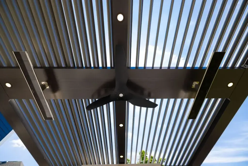 close-up-view-of-roof-louvered-pergola-with-fan-and-lights