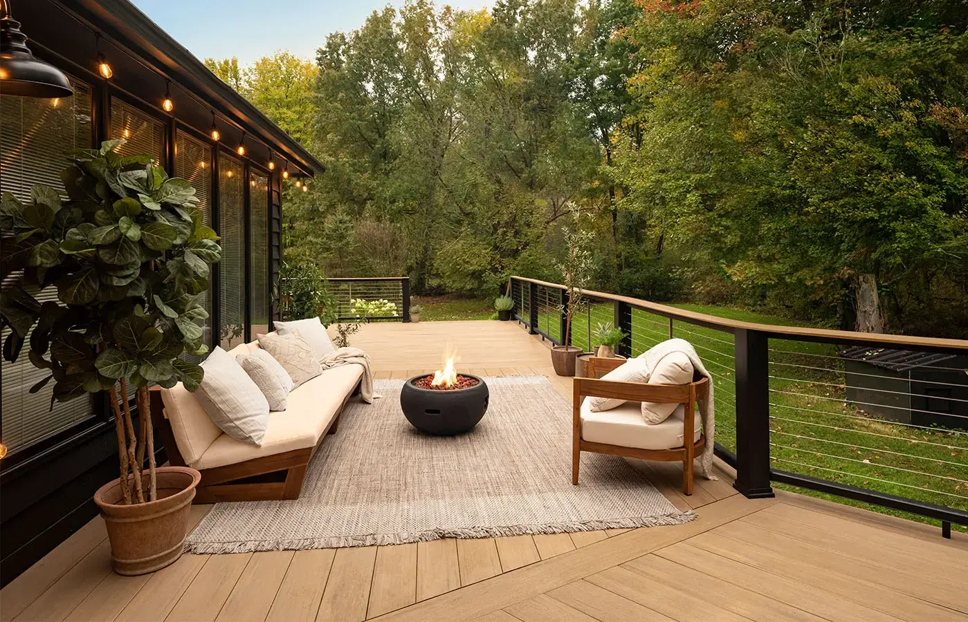 long-commercial-deck-with-outdoor-living-fire-place-and-cable-railing-in-tacoma-wa