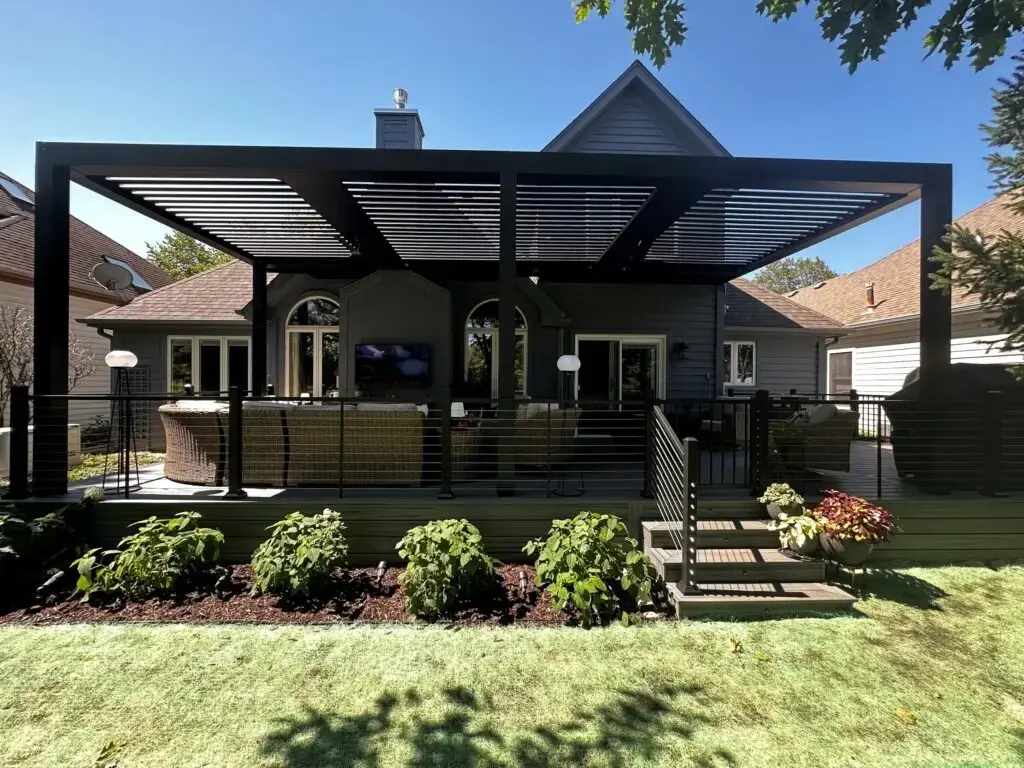 outdoor-living-space-under-black-large-pergola