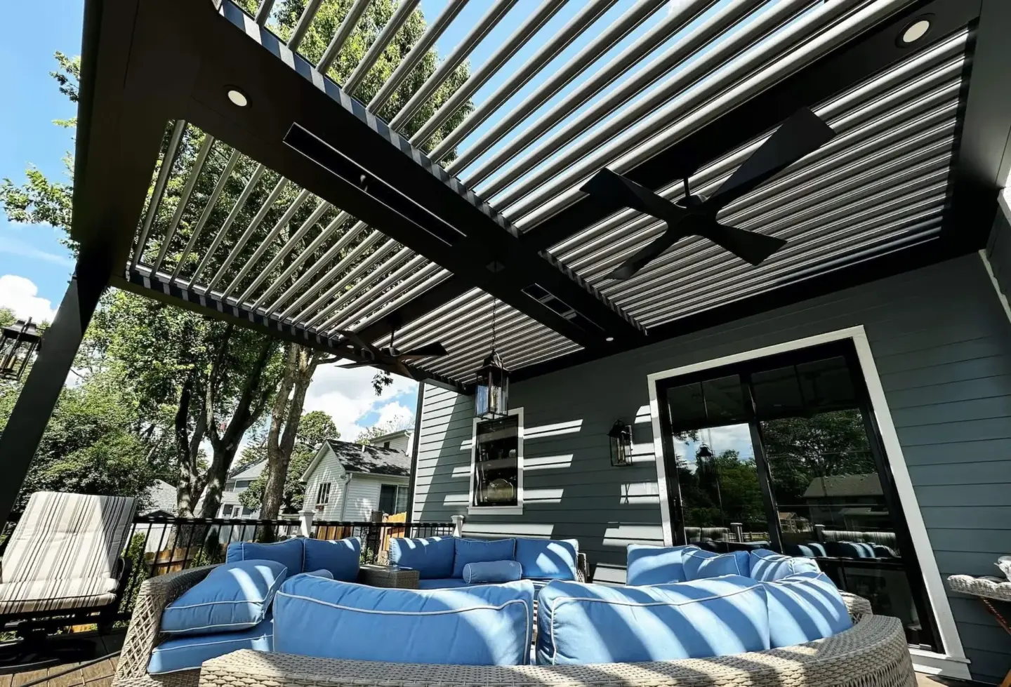 Sk stx pergola deck seating under louvered roof