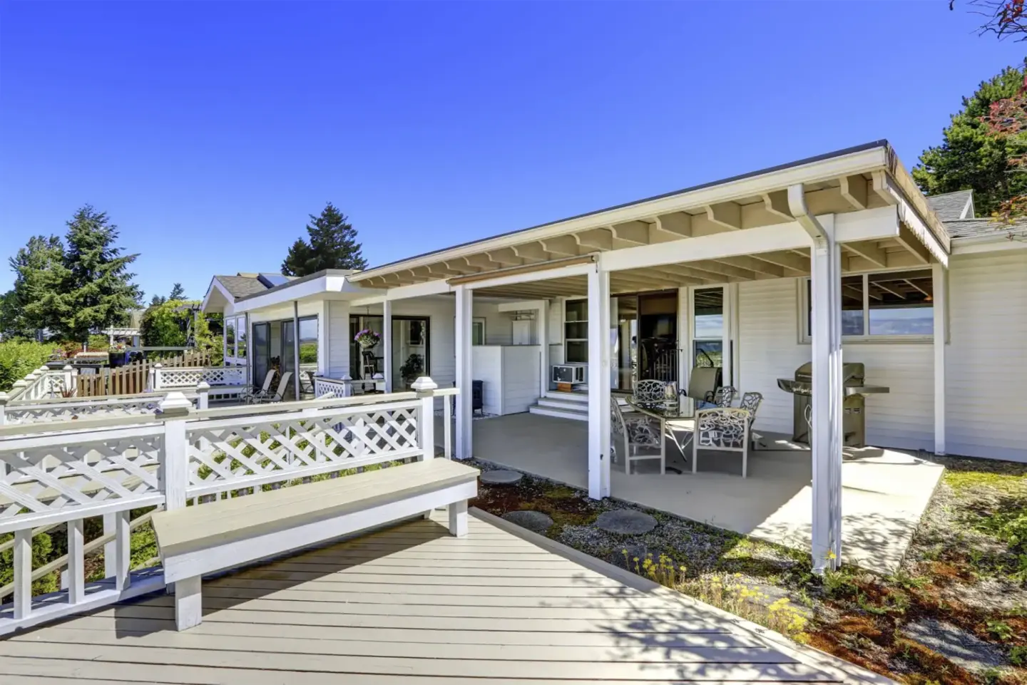 Sk walkout porch with patio area and wooden bench