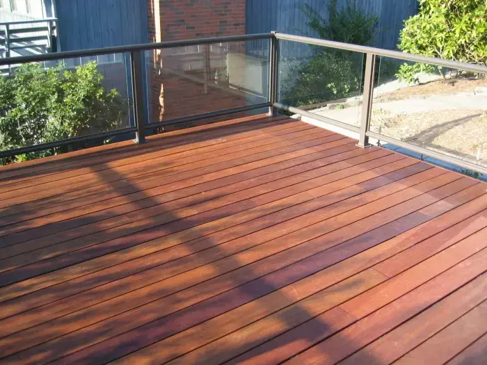 spacious-hard-wood-deck-with-glass-railings